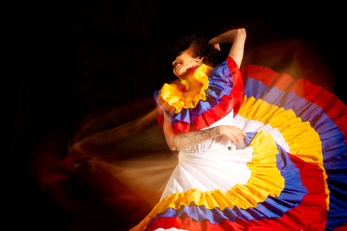 Woman Dancing to Cumbia in Motion